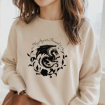 Dragon is my spirit animal, printed in a minimalist style on a natural sand coloured sweatshirt